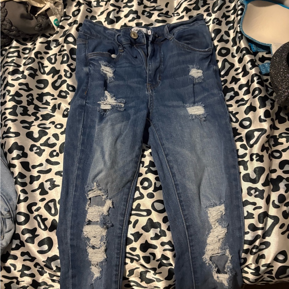 Women's Distressed Blue Jeans
